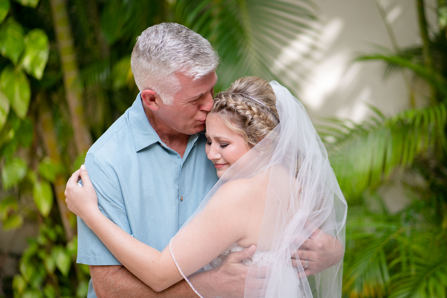 Father of the bride crying destination wedding Cozumel Mexico by St. Louis wedding photographers The Bennetts