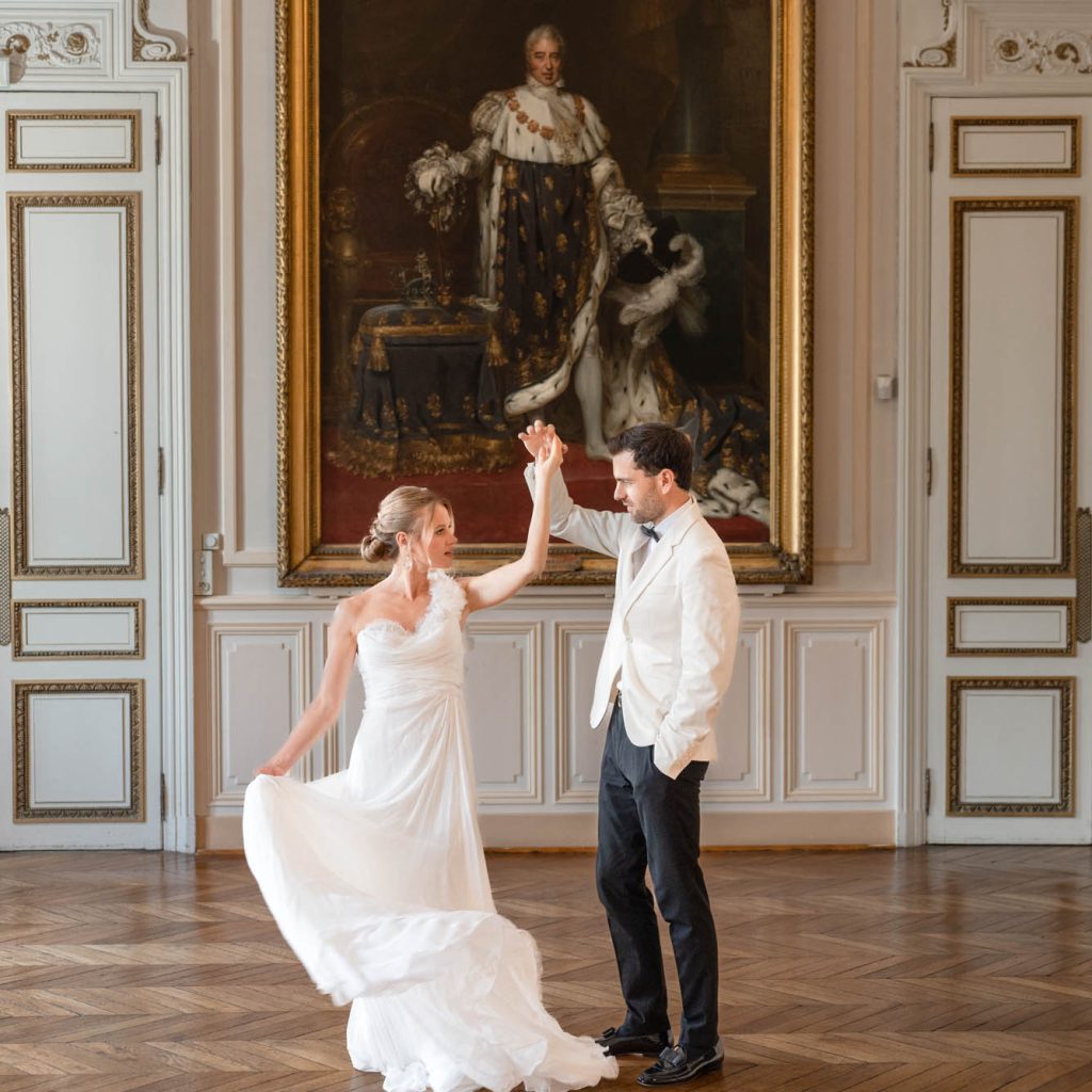 Paris wedding couple twirling by The Bennetts