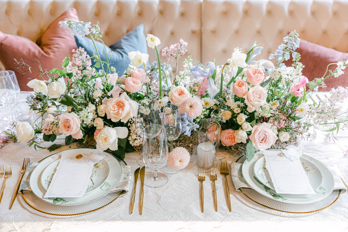 Table with flowers and china dishes St. Louis Wedding Photographer
