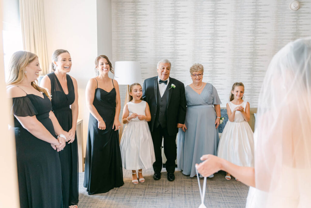 Bride reveal with her family St. Louis