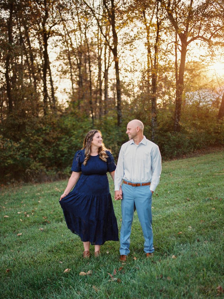 a man and woman holding hands in st Louis mo