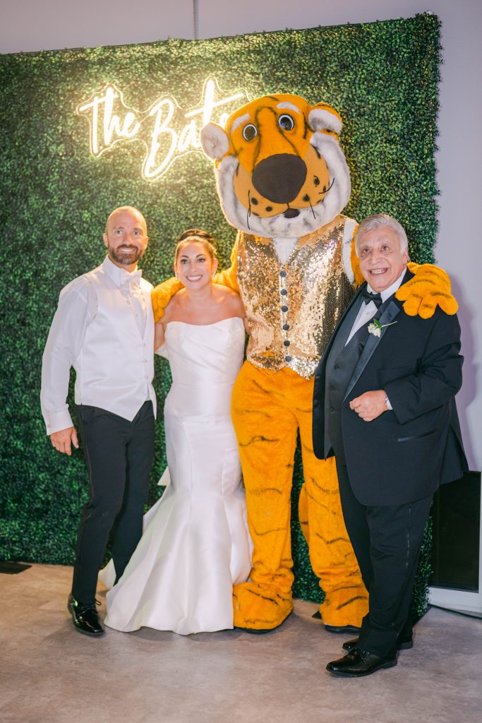 Truman the Tiger with bride and groom