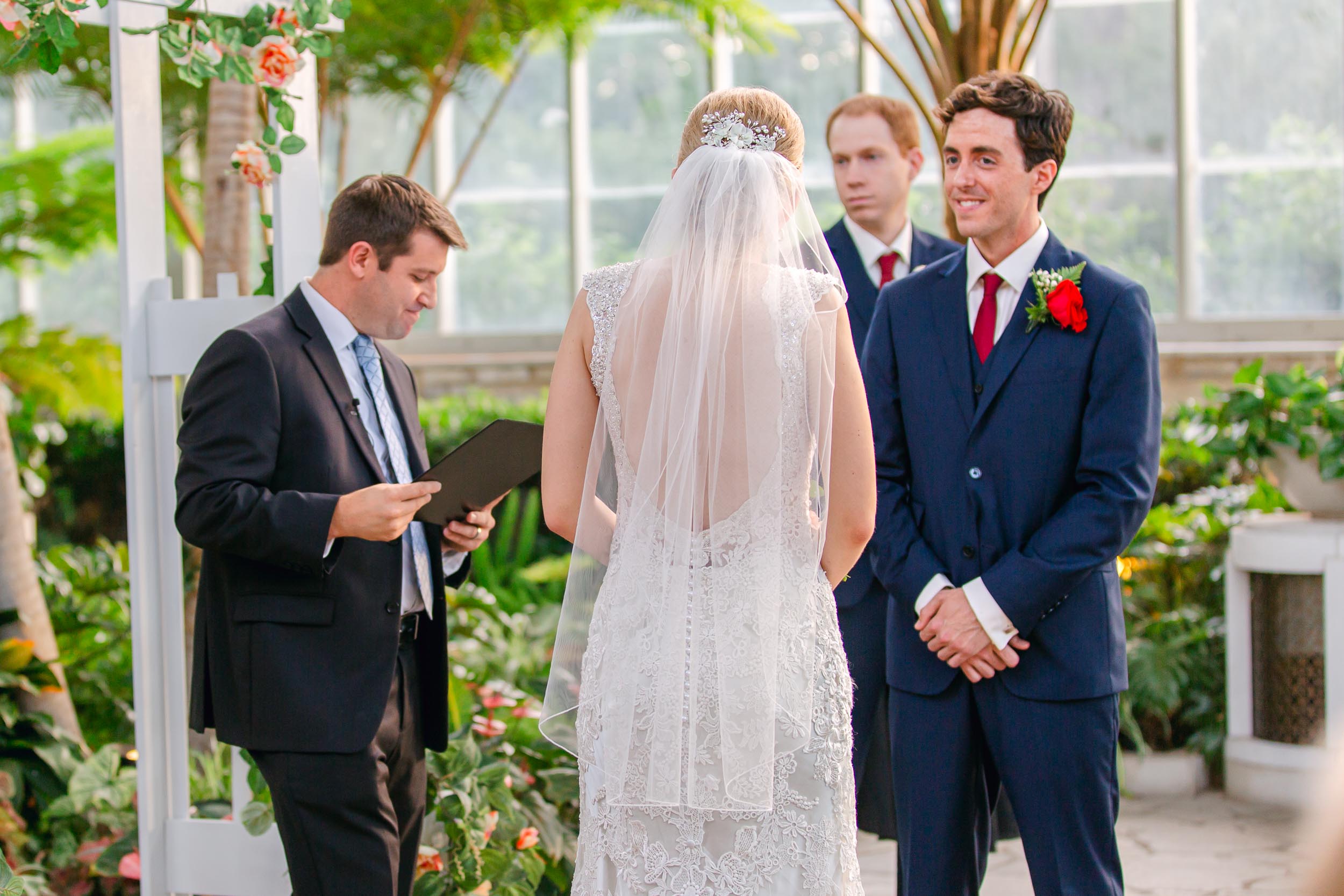 a bride and groom standing in St. Louis Jewel Box