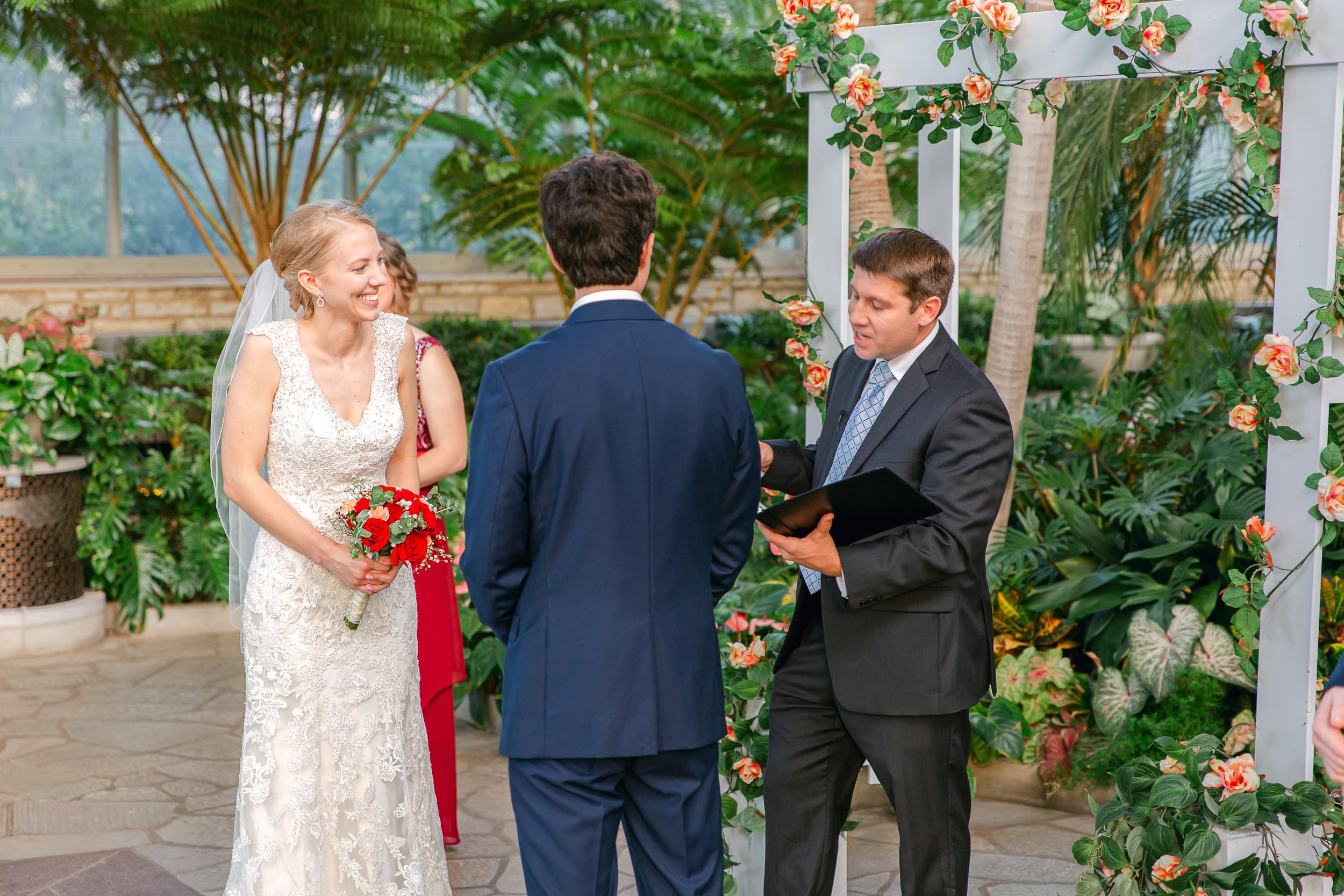 a man in a suit and woman in a wedding dress